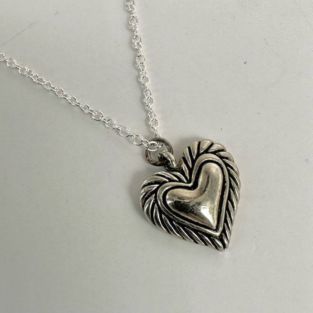 Silver tone heart pendant necklace